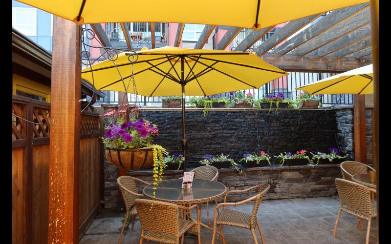 outside patio with water feature in background